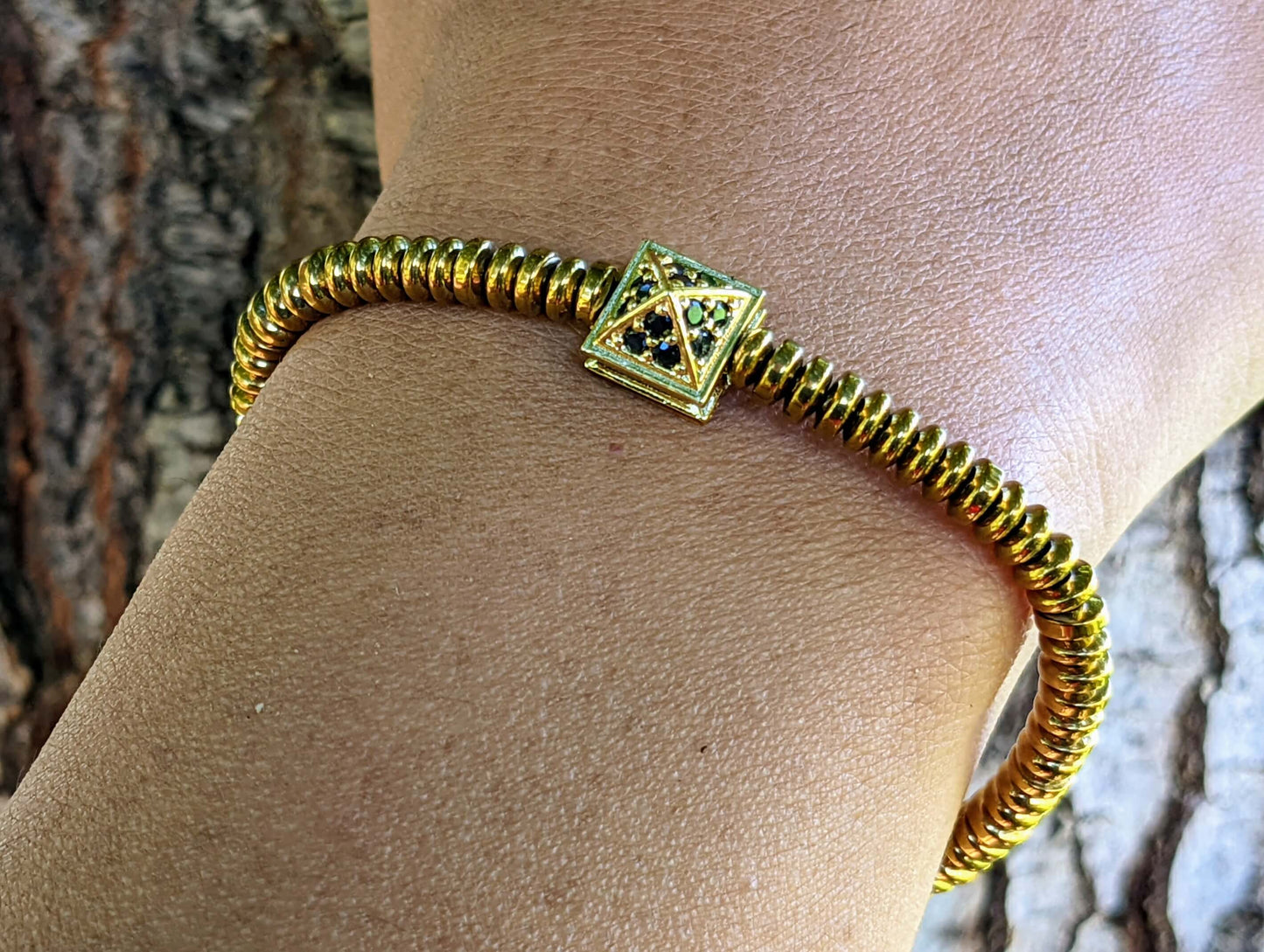 Gold and Black Zirconia Pyramid with Golden Hematite Discs