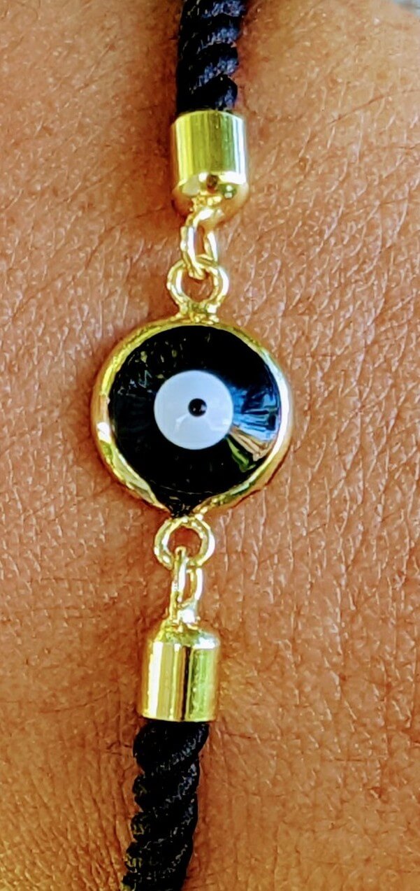 Multiple evil eye bracelet in black cord -