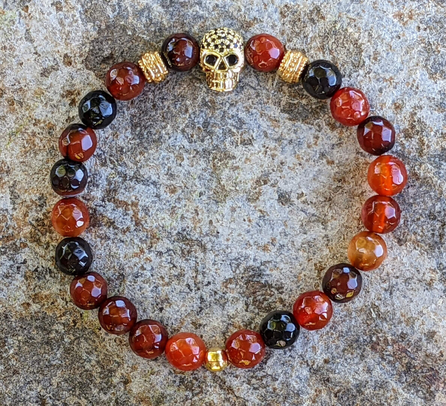 Gold Skull with Black & Red Agate