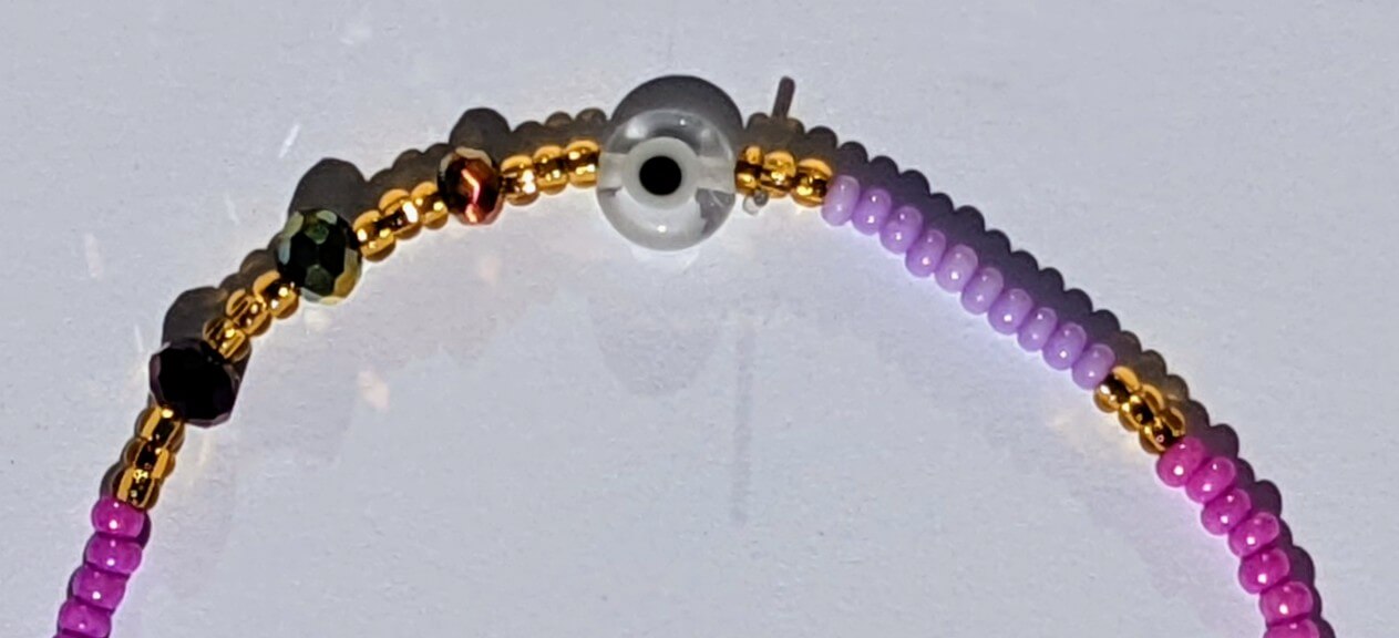 Clear & Black Evil Eye (Flat) with Light Purple Chaquira Bracelet