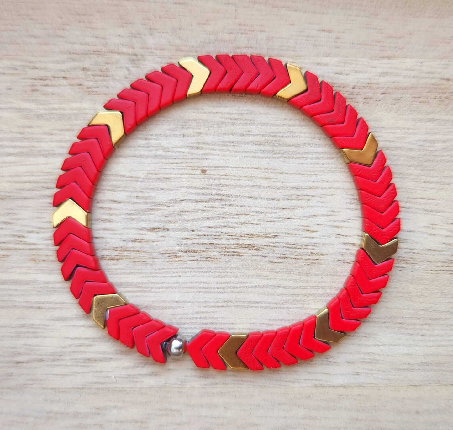 Red Painted/Electroplated Hematite Herringbone Design Bracelet